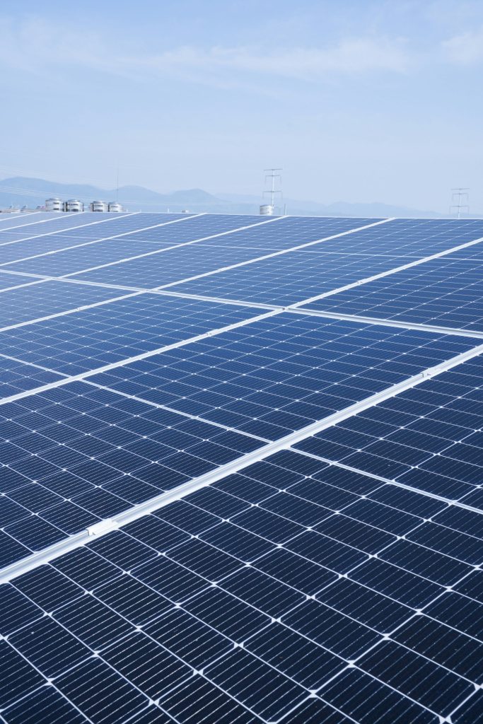 a large solar panel with a sky background